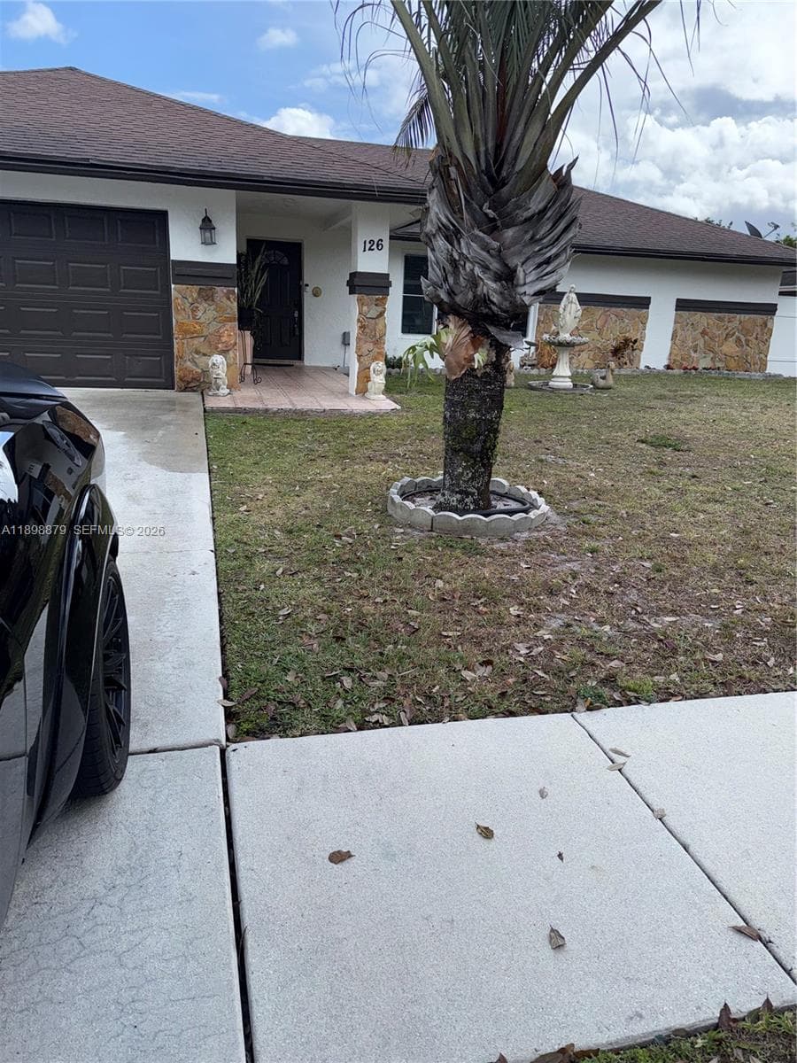 126 Sunflower Cir, Royal Palm Beach FL 33411 — photo 1