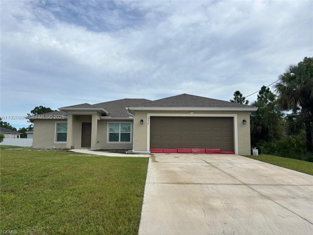 2614 27th ST W, Lehigh Acres FL 33971 — photo 1
